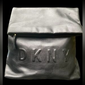 DKNY-black pvc backpack/bag. Interior perfect/outside has small picks/scratches.